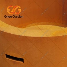 Kulaté topeniště pro skrytou propanovou nádrž z oceli Cor-Ten